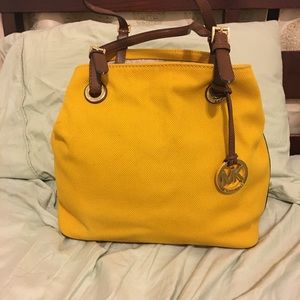 Michael Kors canvas shoulder bag.